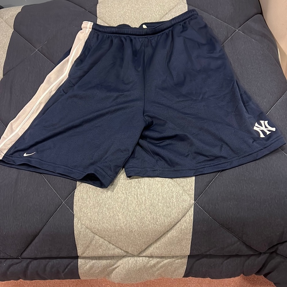 Nike Men’s New York Yankees logo shorts.  3 pairs available.  XL